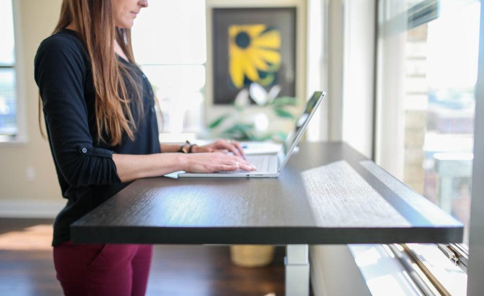 How to Save Your Business Money: Buy Standing Desks